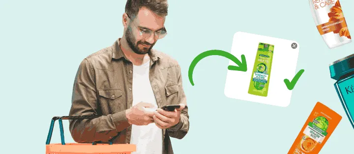 Sepetli adam telefonuna bakıyor, ekranda tam aranan şampuanın fotoğrafı var