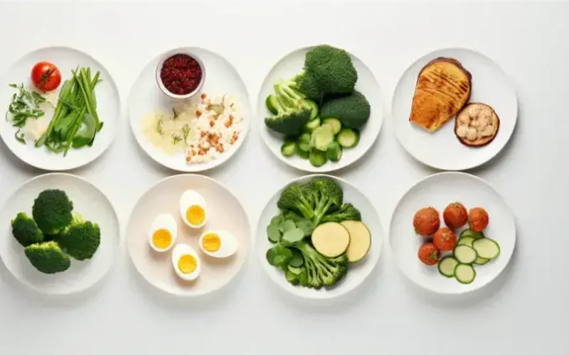 Small bowls of ingredients and dishes for the vegetarian meal plan, shot from above