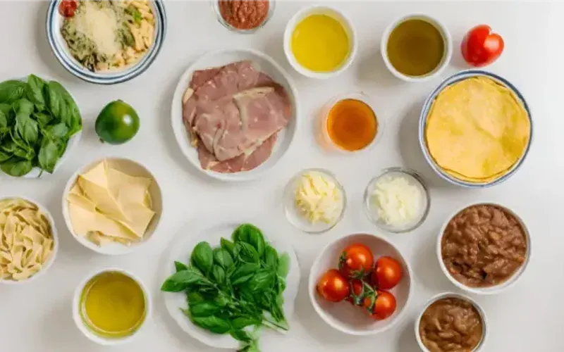 Small bowls of ingredients and dishes for the Italian weight-loss meal plan, shot from above